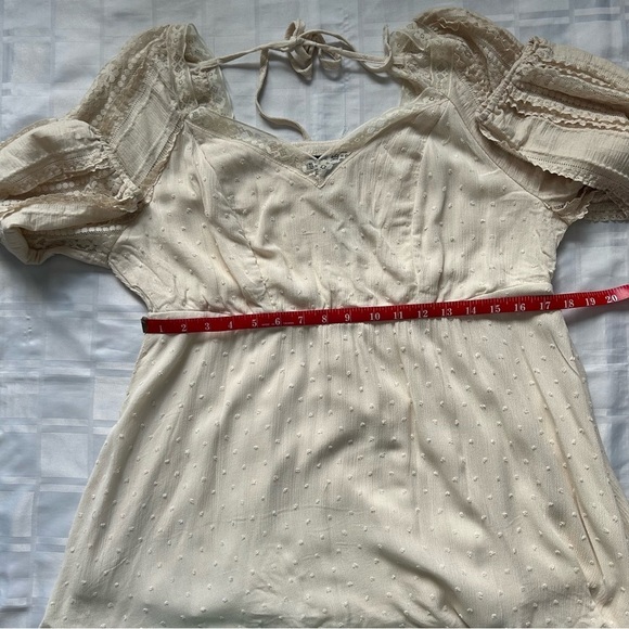 Torrid Cream Peplum Gauze Clip Dot Smocked Back Top - Picture 7 of 13